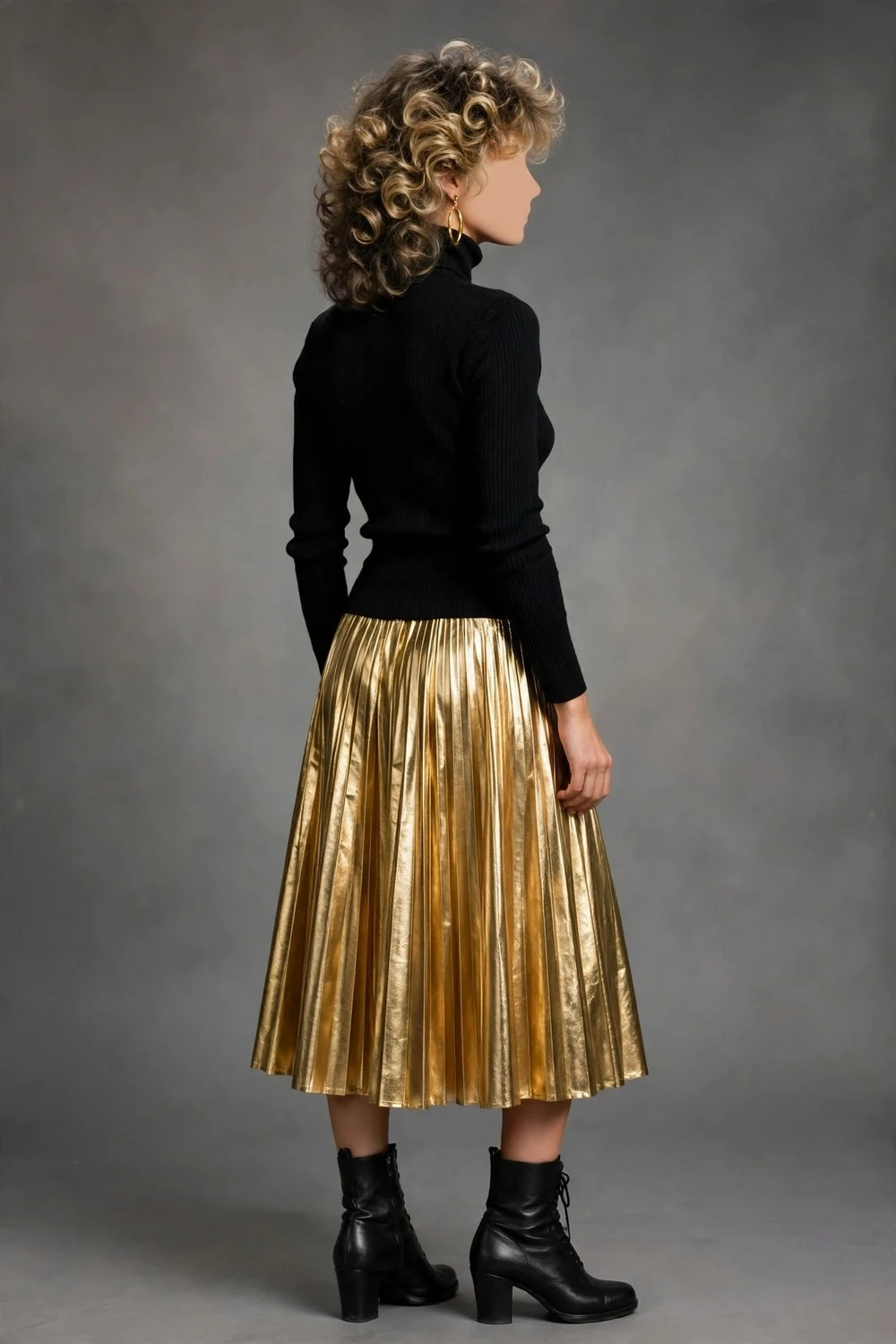 80s luxury outfit with gold metallic pleated skirt and turtleneck